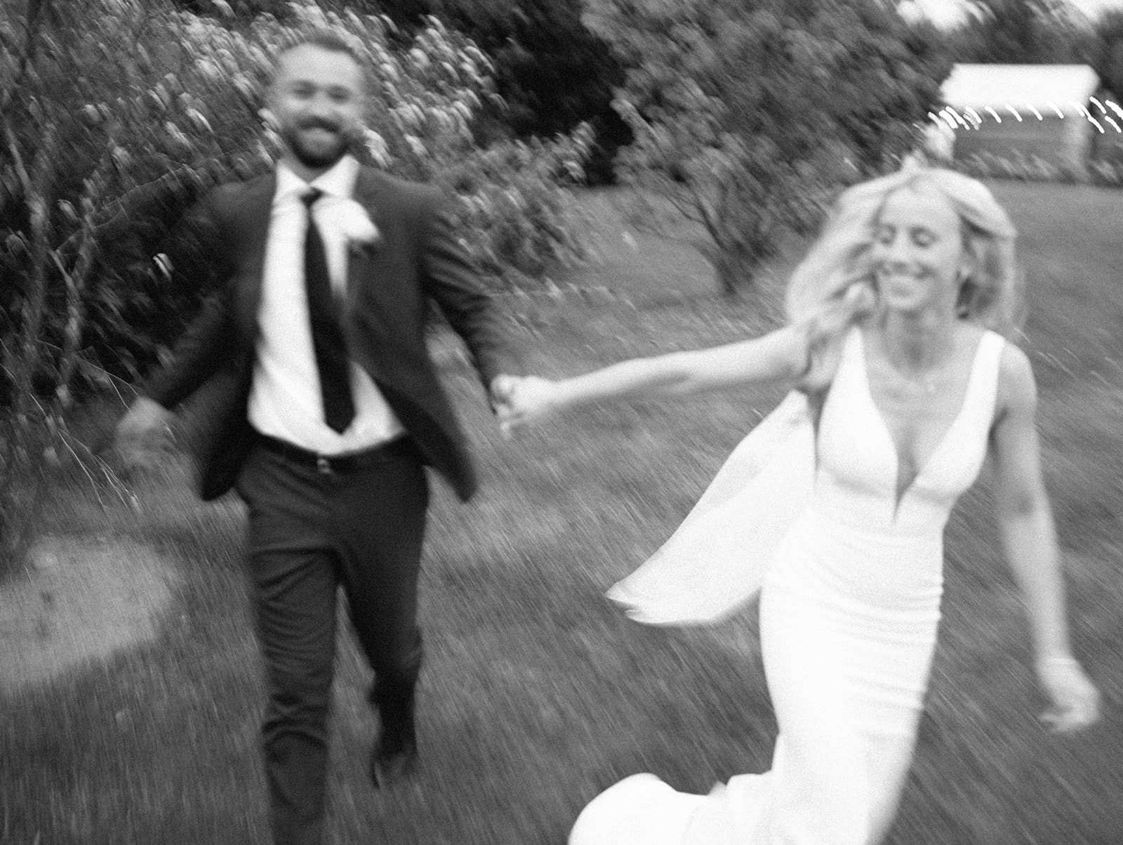 Blurry moment captured on film at Lakecroft wedding in Cherry Valley, Ontario.