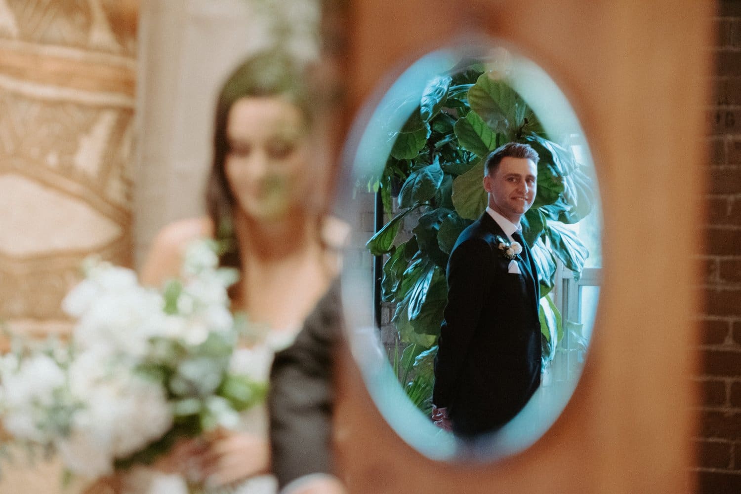 Creative composition of bride and groom on wedding day at intimate Toronto Airbnb wedding.